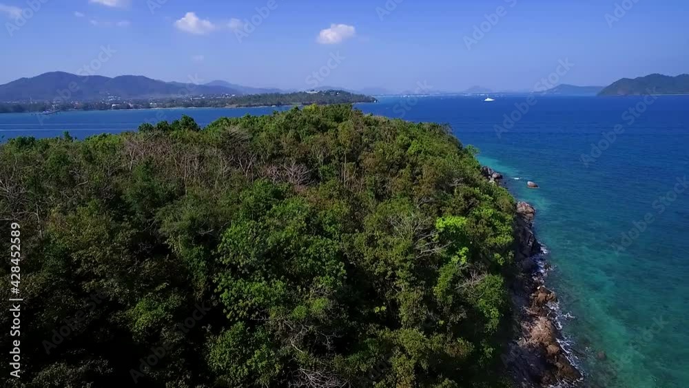Aerial view shot drone Long Boat moored in the sea, bright emerald green water, tourism, snorkeling, White sand beach travel summer Thailand Aerial view shot drone Long Boat moored in the sea, bright emerald green water, tourism, snorkeling, White sand beach travel summer Thailand