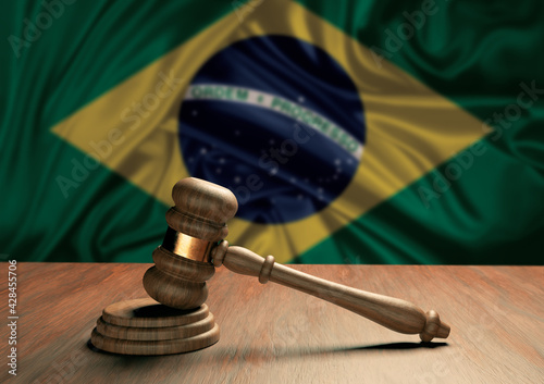 Obraz na płótnie Wooden judge's gavel Symbol of law and justice with the flag of Brazil