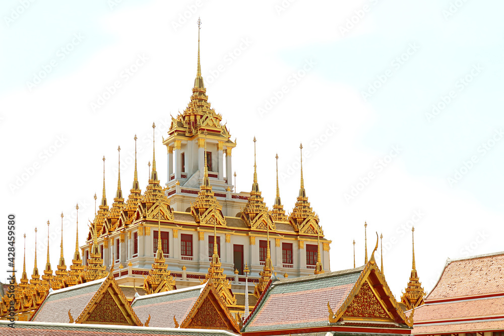 Naklejka premium Fantastic Golden Spires of the Historic Loha Prasat (Iron Castle) inside Wat Ratchanatdaram Temple Located in Bangkok Old City, Thailand