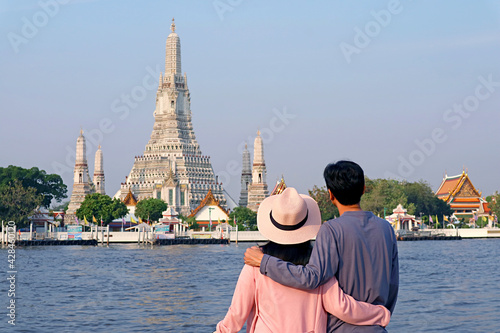 Photography Couple Being Impressed by the Temple of Dawn or Wat Arun, the Iconic Landmark Lo