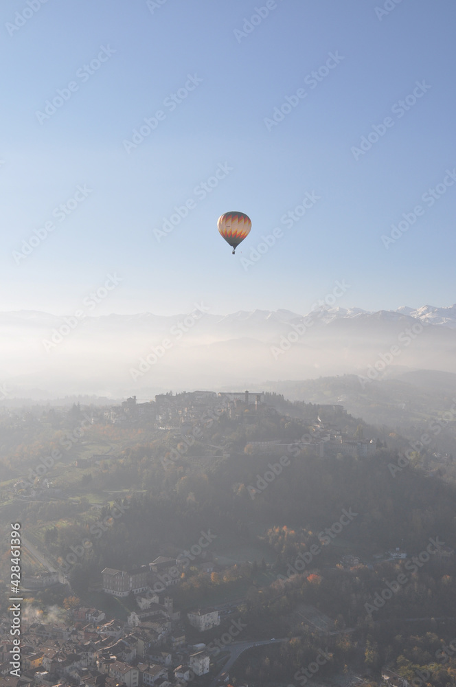 Hot air balloon flying over Italy Hot air balloon flying over Italy