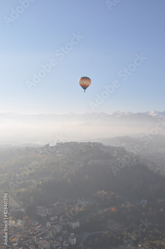 Hot air balloon flying over Italy