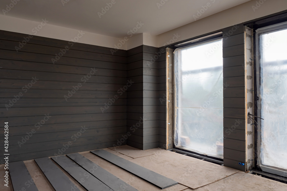 Wall cladding wood. Room is being renovated. Walls of apartment or ...