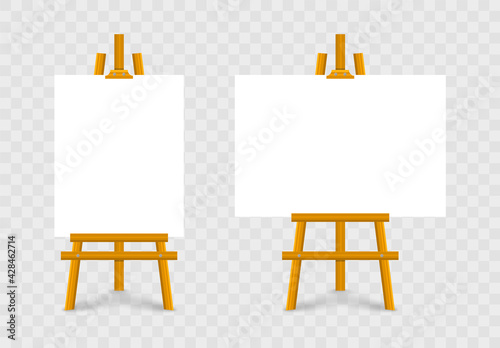 Empty canvas on wooden easel. Wooden brown easels. Blank art board. Mock up white canvas for painting. Easels with horizontal and vertical paper posters. Space for your text and design advertising.