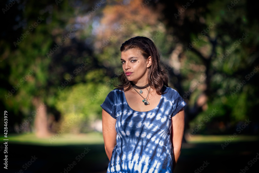 Woman posing sensual on a park