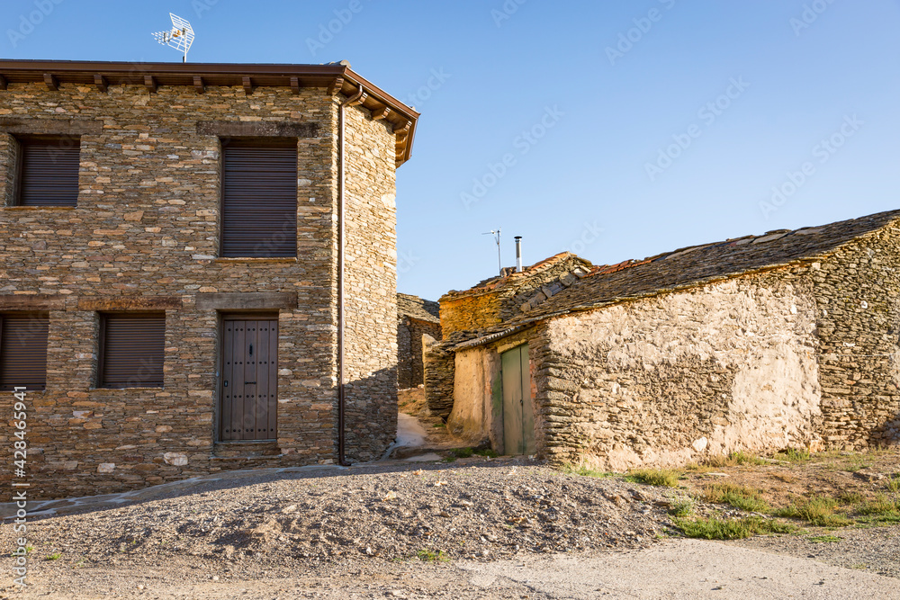 a street with traditional houses in Hiendelaencina, province of Guadalajara, Castile-La Mancha, Spain