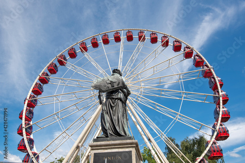 national monument and funfair ferris wheel in Geneva, Switzerland