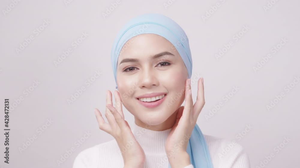 close up of young beautiful muslim woman with hijab isolated on white background studio, muslim beauty skin care concept. close up of young beautiful muslim woman with hijab isolated on white background studio, muslim beauty skin care concept.