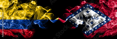 Colombia  Colombian vs United States of America  America  US  USA  American  Arkansas  Arkansan smoky mystic flags placed side by side. Thick colored silky abstract smokes flags.