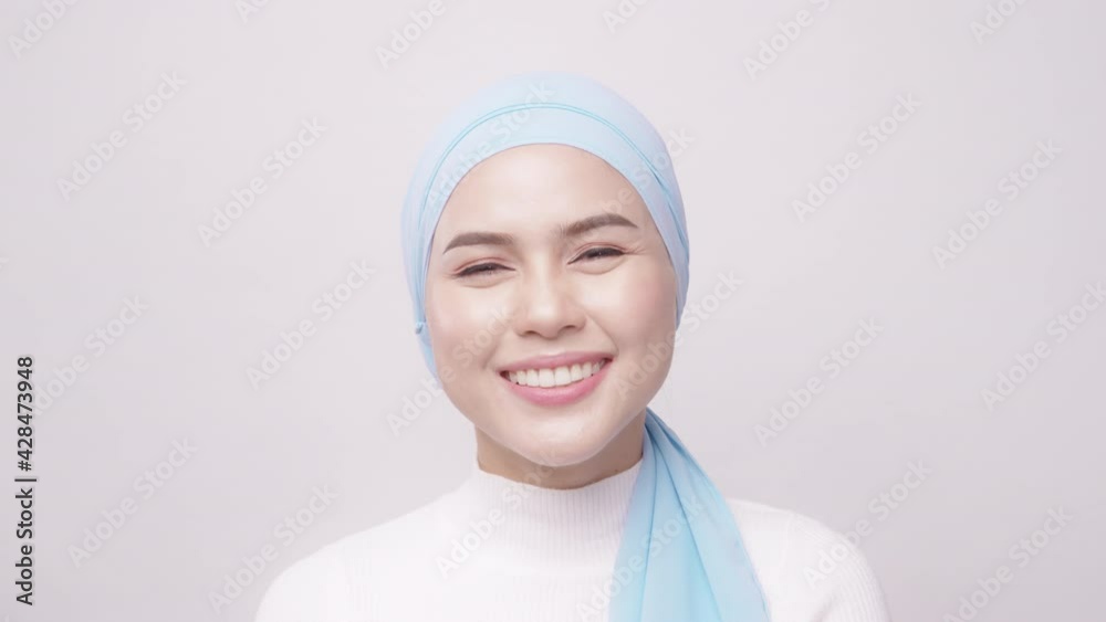 close up of young beautiful muslim woman with hijab isolated on white background studio, muslim beauty skin care concept. close up of young beautiful muslim woman with hijab isolated on white background studio, muslim beauty skin care concept.