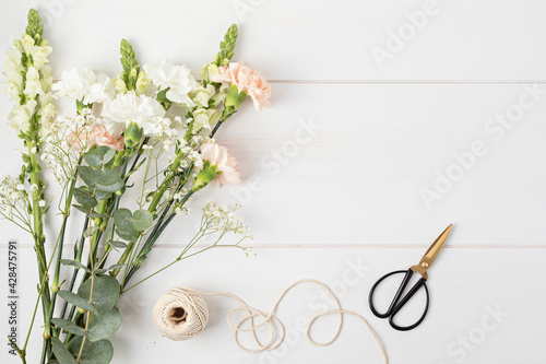 Floral decoration master class, creative workshop, bridal bouquet. Bouquet making in florist shop photo