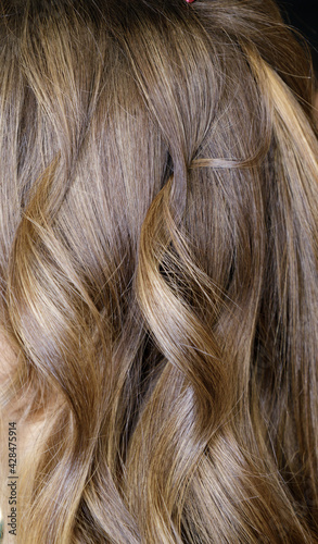 Beautifully stacked model hair curls with natural hair. selective focus.High quality photo