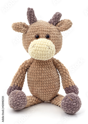 One knitted brown bull.