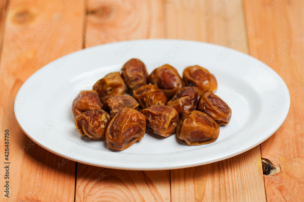 Dates are a fruit that Muslims eat during Ramadan to break their fast. Dates are a fruit that Muslims eat during Ramadan to break their fast.