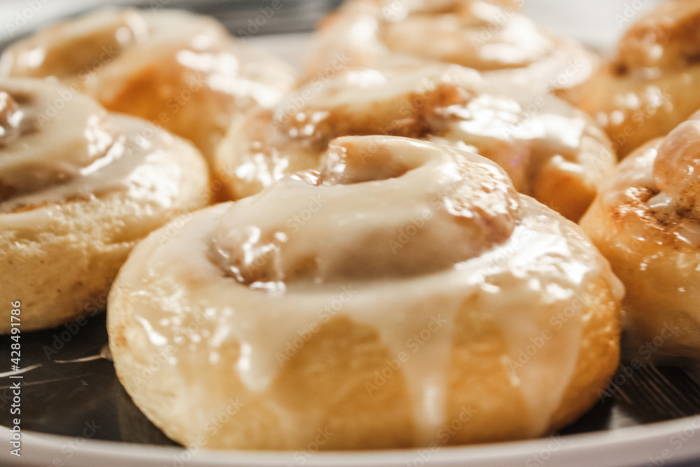 Delicious hot cinnamon roll with icing Delicious hot cinnamon roll with icing