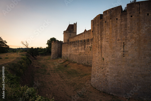 Landscape at sunrise of the exterior of the castle walls and the fortified city of Carcassonne, UNESCO World Heritage Site, France
