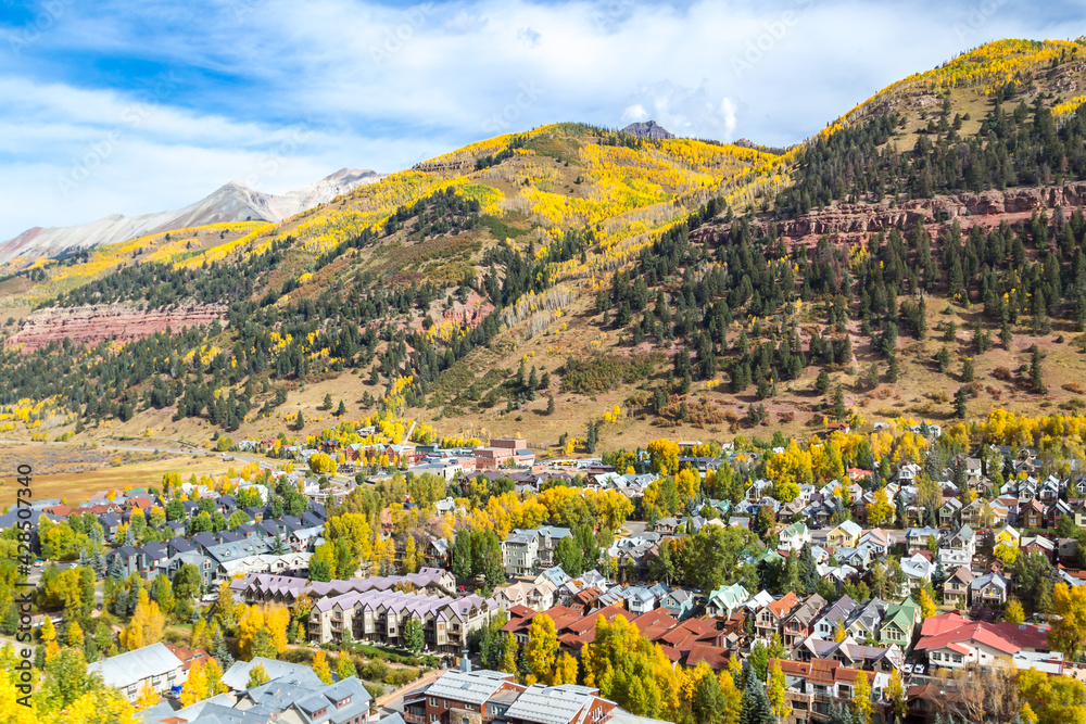 Obraz premium Telluride Colorado Condos - Aerial view of west end condos in Telluride Colorado with the San Juan Mountains in the background on a fall afternoon