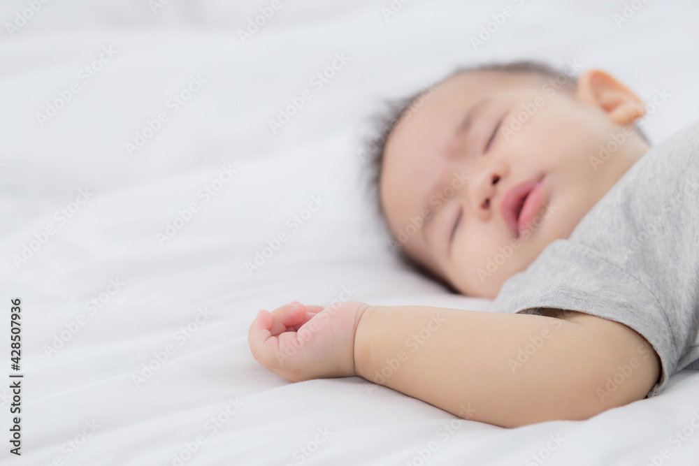 Portrait of asian little baby girl sleeping on bed in the bedroom at home, newborn napping with cozy and relax, infant innocence in bedtime, happy toddler cute, growth of child and emotion, indoors. Portrait of asian little baby girl sleeping on bed in the bedroom at home, newborn napping with cozy and relax, infant innocence in bedtime, happy toddler cute, growth of child and emotion, indoors.