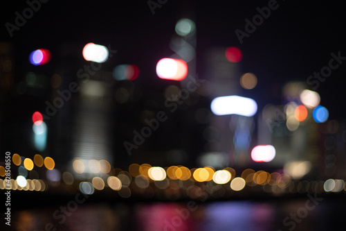 deliberately blurred Colorful magnificent Night city view of Central, Hong Kong, photo from Wan Chai promenade, Hong Kong