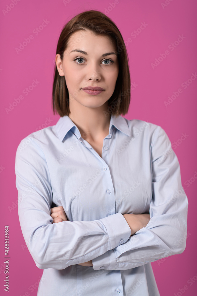 Portrati shot of beautiful blond businesswoman standing with arms crossed at isolated white background. Portrati shot of beautiful blond businesswoman standing with arms crossed at isolated white background.