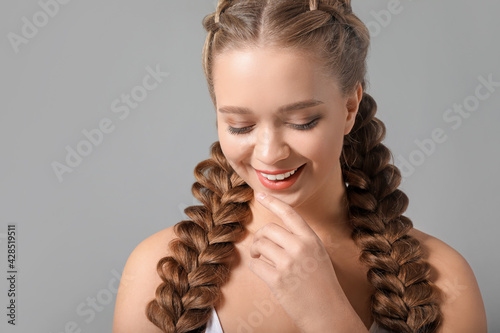 Beautiful young woman with ...