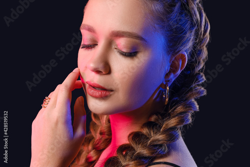 Beautiful young woman with ...