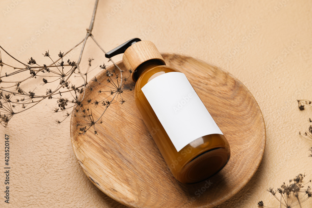 Bottle with natural shampoo on color background Bottle with natural shampoo on color background