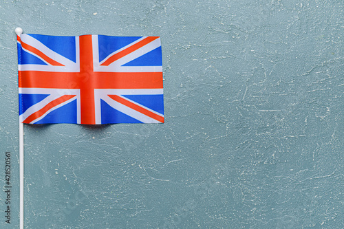 National flag of the United Kingdom on color background photo