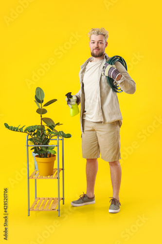 Young male gardener on colo...