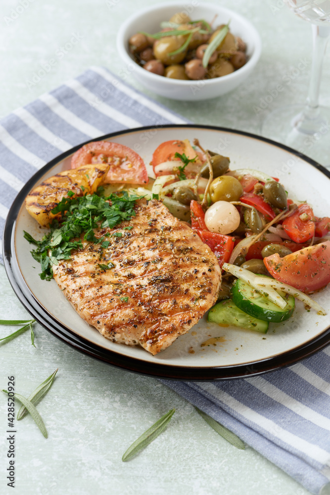 Grilled Turkey Breast with fresh salad. Bright background. Grilled Turkey Breast with fresh salad. Bright background.