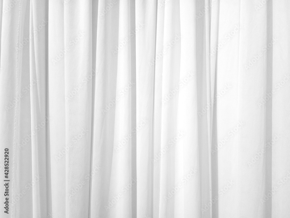 Soft white curtains are simple yet elegant for graphic design or wallpaper Soft white curtains are simple yet elegant for graphic design or wallpaper