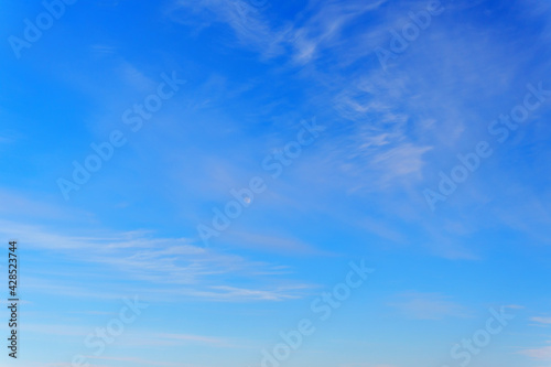 Fototapeta Naklejka Na Ścianę i Meble -  Air clouds in the blue sky.Blue backdrop in the air. Abstract style for text.
