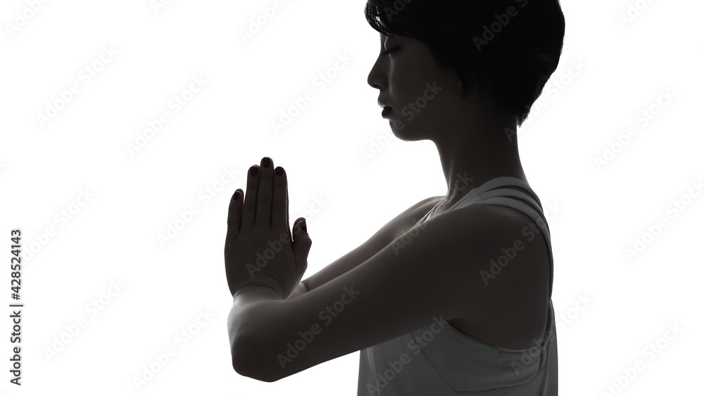 Fototapeta premium ヨガをする女性 マインドフルネス シルエット