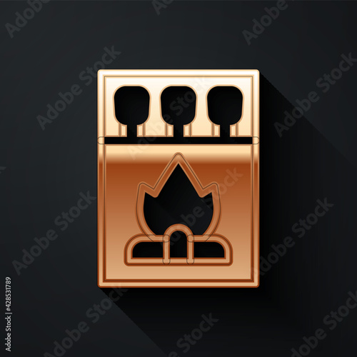 Gold Open matchbox and matches icon isolated on black background. Long shadow style. Vector