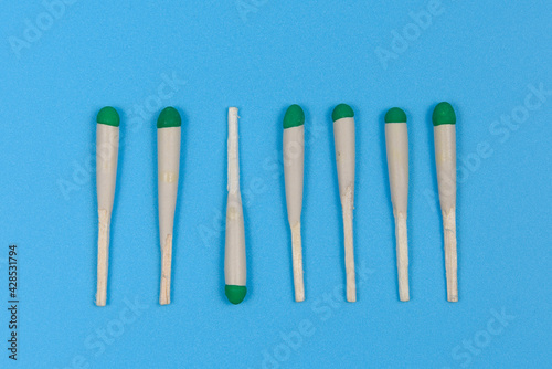 Several hunting matches on a blue background.