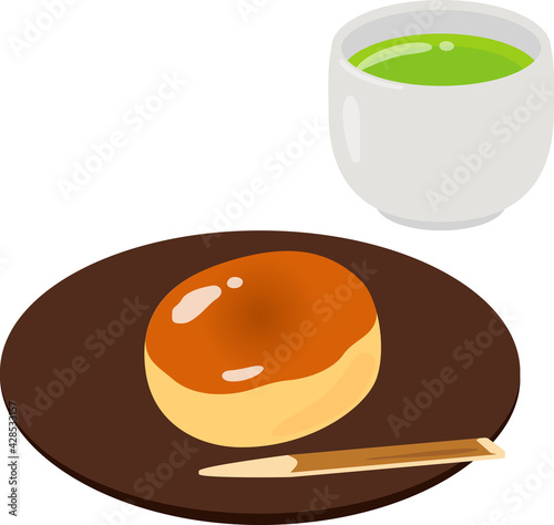 皿に盛った栗饅頭と緑茶