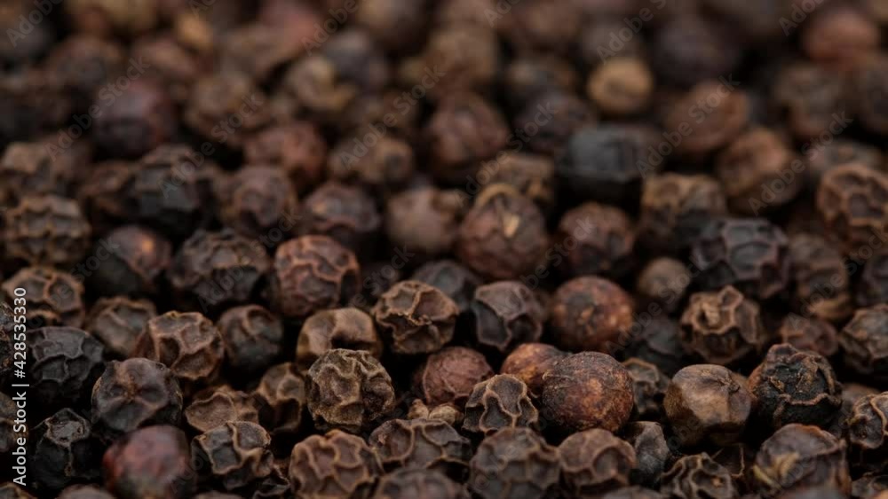 Peppercorn close up. Flavorful and aromatic black pepper. 4K UHD video Peppercorn close up. Flavorful and aromatic black pepper. 4K UHD video
