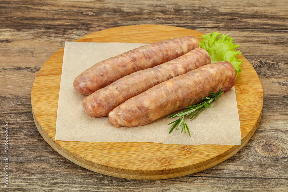 Raw pork meat sausages for grill Raw pork meat sausages for grill