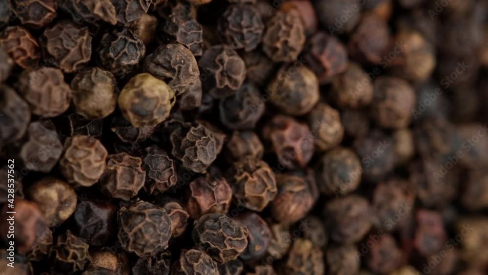 Peppercorn close up. Flavorful and aromatic black pepper. Vertical video. 4K UHD video Peppercorn close up. Flavorful and aromatic black pepper. Vertical video. 4K UHD video