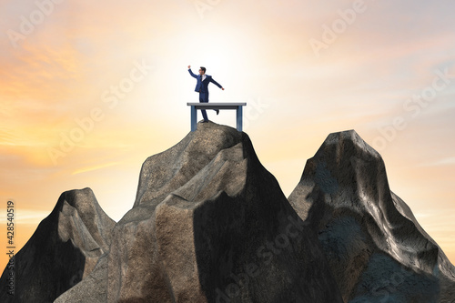 Businessman self isolating on the top