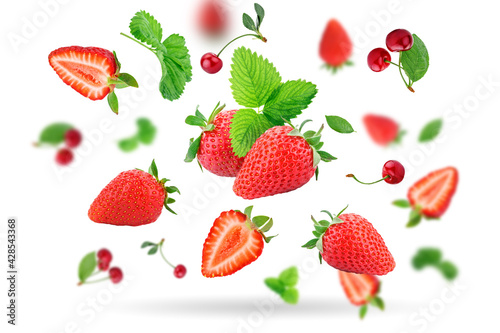 Strawberry berries levitating on a white background. Isolated object on a white background. Horizontal.