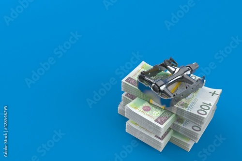 Bicycle pedal on stack of money