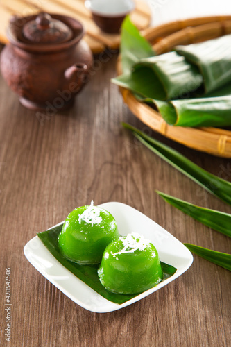 Kuih kosui, traditional Malaysian Nyonya sweet dessert cake. It is best eaten with freshly grated coconut. photo