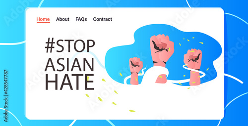 activists holding raised up fists against racism stop asian hate support people during covid-19 coronavirus pandemic