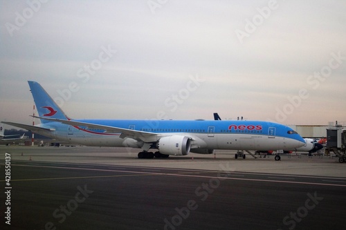 2020.12.27 Milan Malpensa Airport, Neos airline in flight in Italy, plane stopped in the rest area waiting for passengers