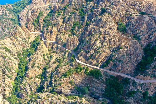 Aerial view from the country road D81 road through the Calanches de Piana on the west coast of  Corsica, France. Tourism and vacation concept photo