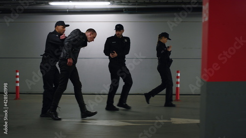 Fotografie Police team arresting criminal