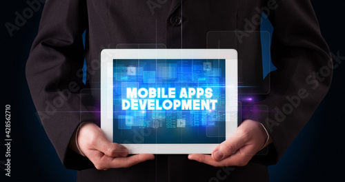 Wallpaper Mural Person holding tablet, technology concept Torontodigital.ca