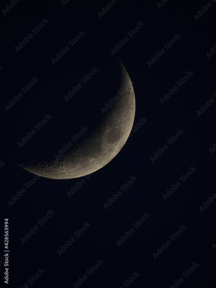 half moon on black sky background at night half moon on black sky background at night