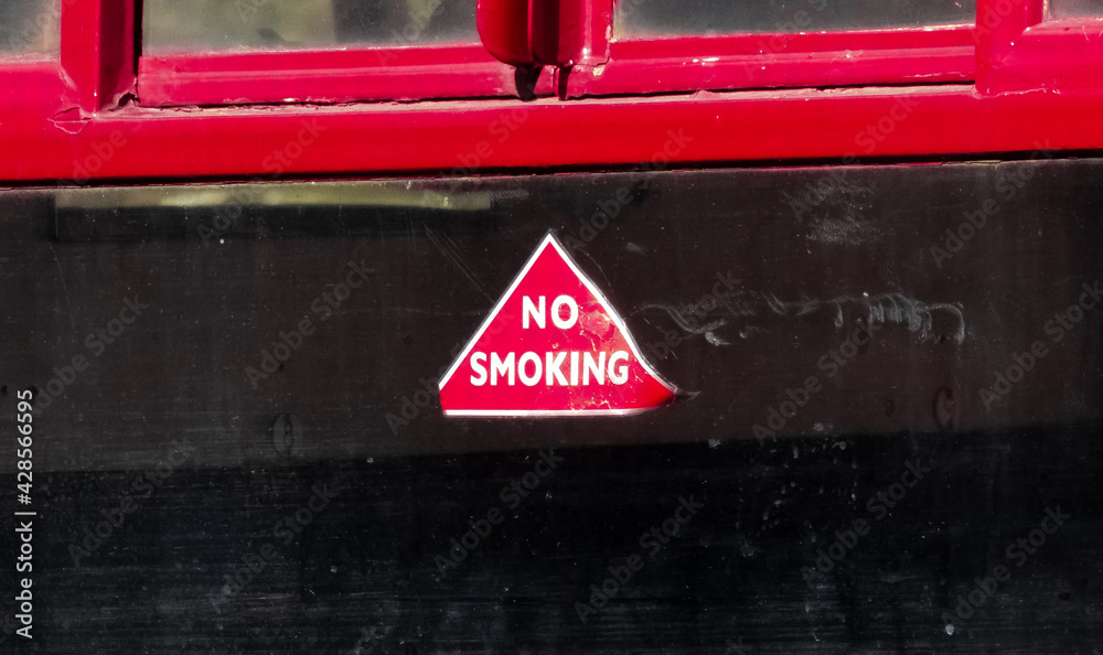 no smoking sign in the window